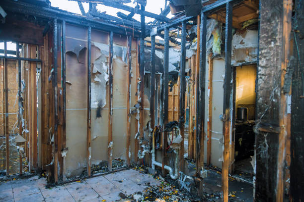 Professional Fire Damage Restoration technician working in Milltown, NJ